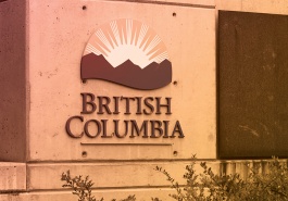 Report cover image showing the B.C. government logo on an outdoor sign
